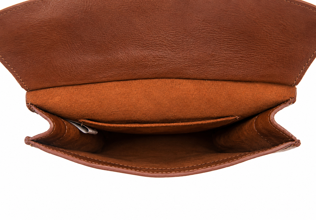 Compartimentos interiores de bolsa bandolera de piel miel